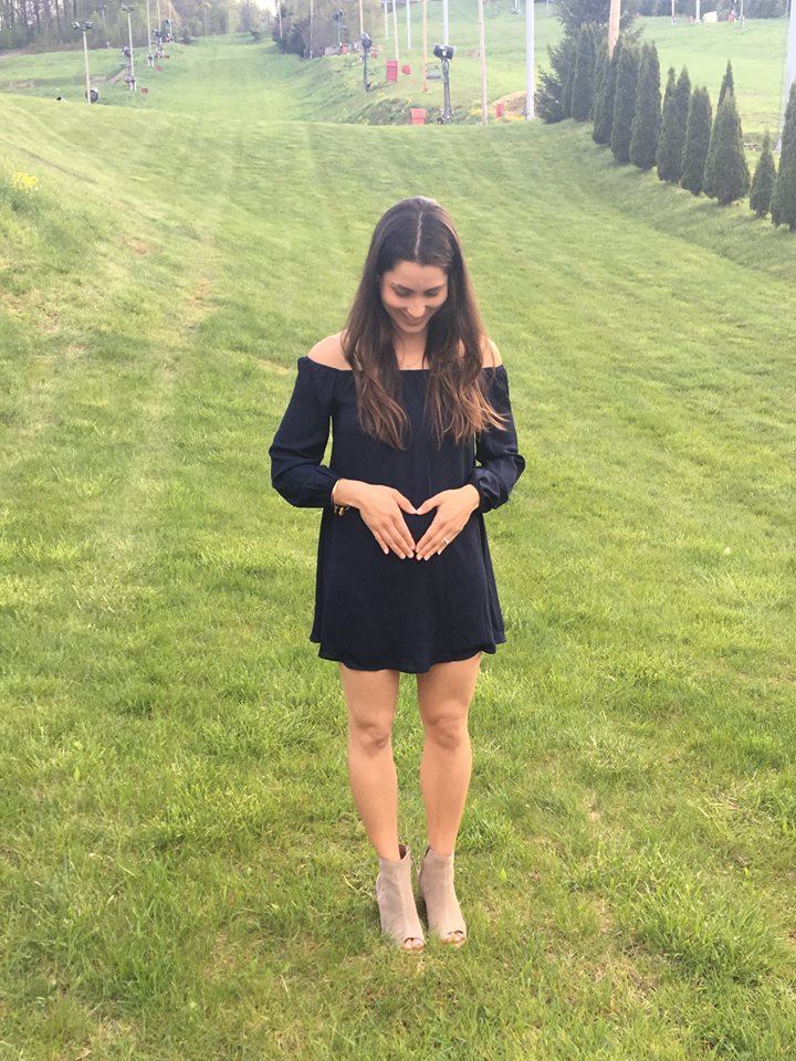 angie holding tummy.jpg